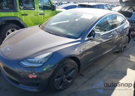 2017 Tesla Model 3 Long Range/Standard z USA, uszkodzony, nr VIN 5YJ3E1EA9HF001294